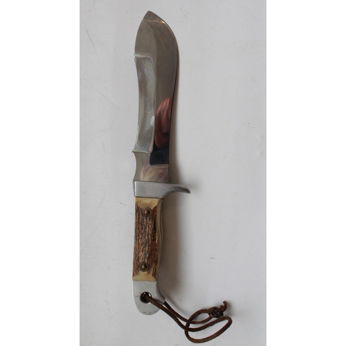 1602 - Tonerini Italian Hunting knife. Full tang with two piece antler grip and alloy guard and pommel. Thr... 