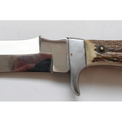 1602 - Tonerini Italian Hunting knife. Full tang with two piece antler grip and alloy guard and pommel. Thr... 