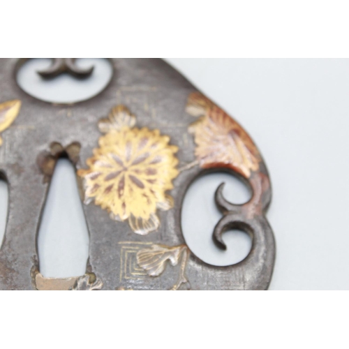 1618 - Japanese Bronze Tsuba circa early 19th century, with raised blossom and butterfly design in gilt hig... 