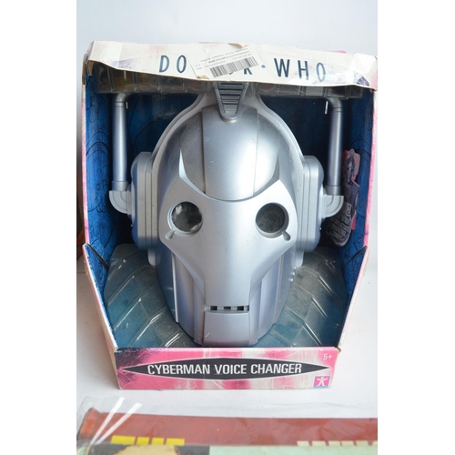 128A - Collection of Dr Who themed merchandise to include annuals, models, a Cyberman voice changing helmet... 