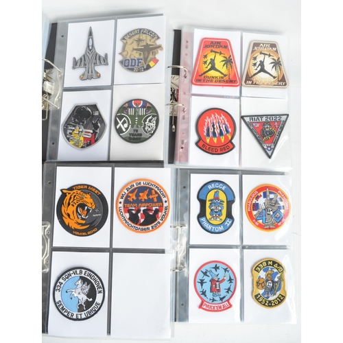 1232 - Four A4 sized ring binders and a plastic tub containing a superb and varied collection of unit, squa... 