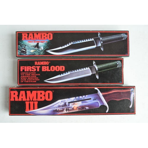 75A - Three officially licensed full size Rambo movie replica bowie knives from First Blood, First Blood P... 