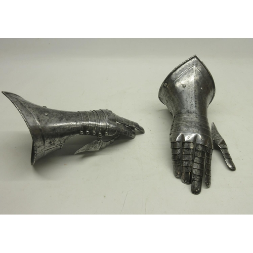 Pair of Italian 17th century style steel articulated gauntlets.