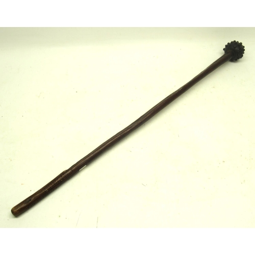 1611 - Knobkerrie type club with metal studded head, the grip with carved cross hatching, 87cm overall