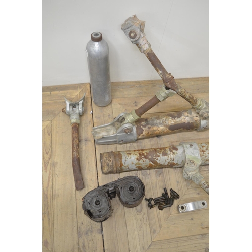 1668 - Collection of He111 wreckage to include undercarriage sections, a gun magazine and an oxygen bottle ... 