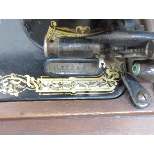 292 - Singer hand sewing machine R772875, in wooden case