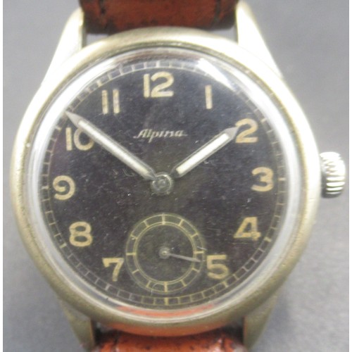 1252 - Alpina 592 Luftwaffe pilots wrist watch. Brass case and steel back. Black face, with subsidiary seco... 