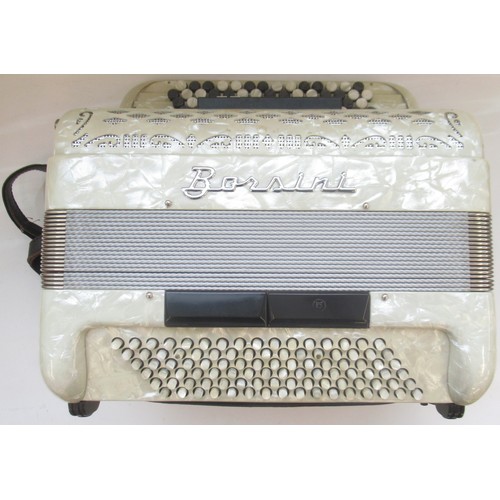 854 - Early 1970's Borsini piano accordion in cream marbleized acrylic case, simulated black and white mot... 