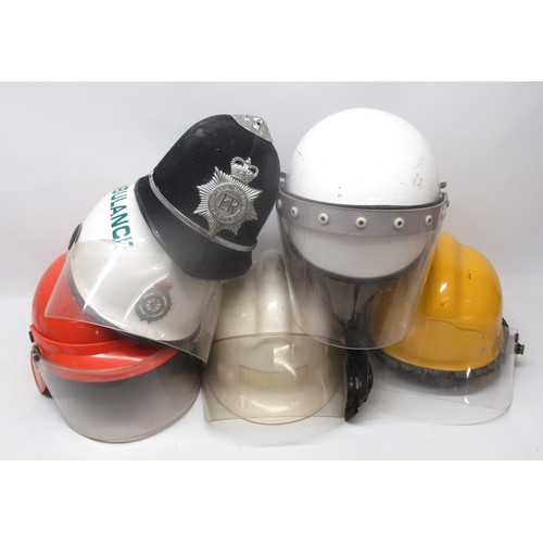 1319 - Six vintage helmets of various styles and eras, including a C2000s Pacific AK90 West Yorkshire Ambul... 