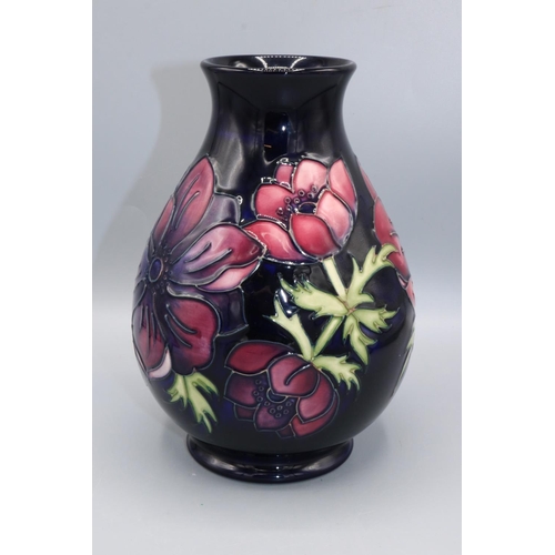 352 - Moorcroft Pottery: Anemone pattern baluster vase, red and purple flowers on dark blue ground, H19.5c... 