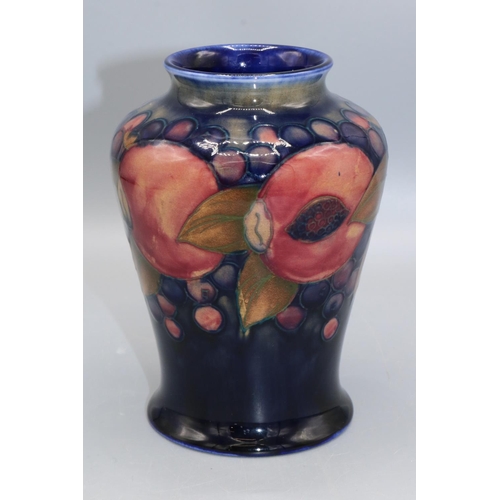 361 - Moorcroft Pottery: Pomegranate pattern high shouldered vase, fruit on dark blue ground, H13.5cm