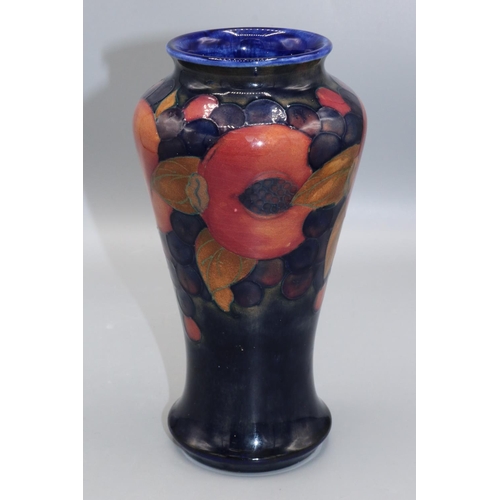 362 - Moorcroft Pottery: Pomegranate pattern high shouldered vase, fruit on dark blue ground, H18.5cm