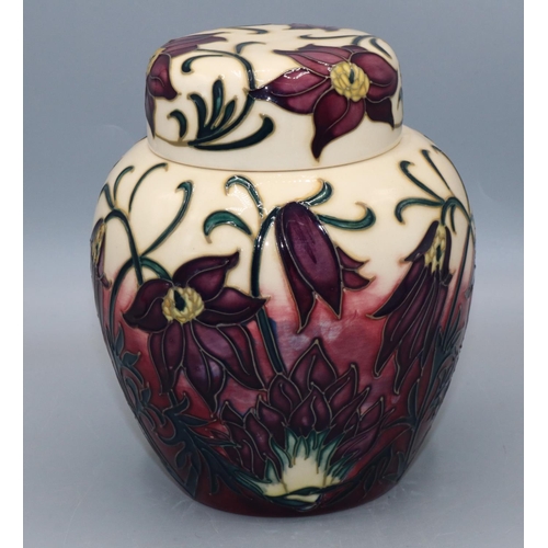 367 - Moorcroft Pottery: Pasque pattern ginger jar, purple flowers on graduated cream to maroon ground, H1... 