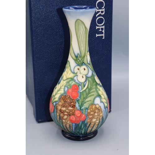 378 - Moorcroft Pottery: Holly and Mistletoe small baluster vase, limited edition of 150, H17cm