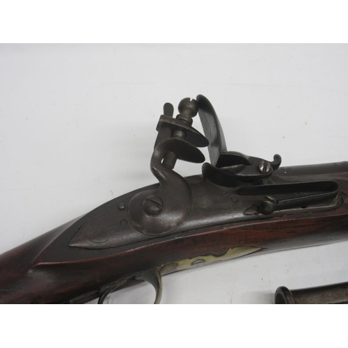 565 - A good copy of a East India Company flintlock 'Brown Bess' musket, dated 1776, . Barrel length 39'' ... 