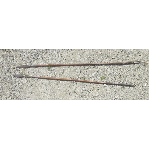 300 - Tribal fishing spear with barbed metal blade and wooden handle and a similar hunting spear, L121cm (... 