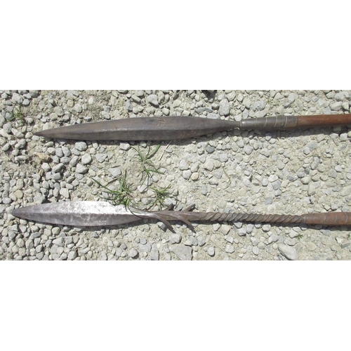 300 - Tribal fishing spear with barbed metal blade and wooden handle and a similar hunting spear, L121cm (... 