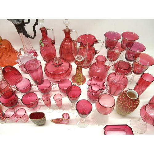 333 - Large collection of cranberry glass including decanters, hand painted glasses, goblets, jugs, bowls ... 