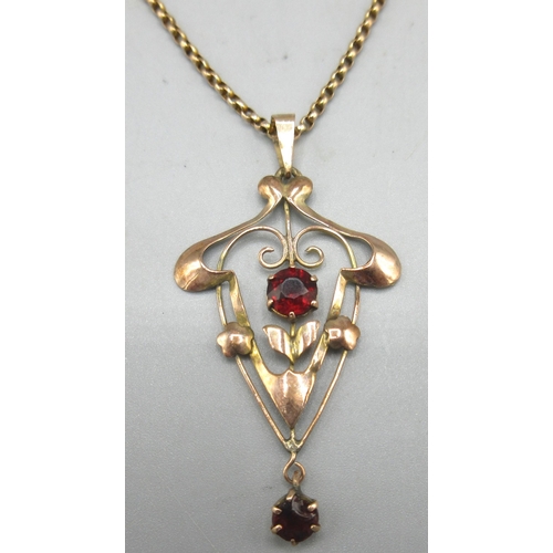 35 - Edwardian 9ct rose gold drop pendant set with garnets, stamped 9ct, on rose gold chain, L43.5cm, 3.4... 