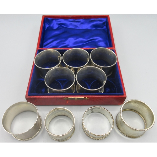 64 - George V silver cased set of five matching monogrammed napkin rings by Mappin & Webb Ltd, Birmingham... 