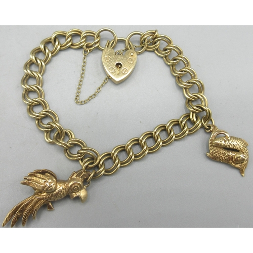 162 - 9ct yellow gold double link charm bracelet, set with 9ct gold fish charm, stamped 375, and an unmark... 