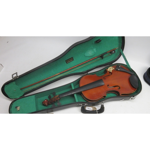 66 - Three cased Violins including Skylark brand Violin with bow, Lark Violin with two bows, and an Anton... 