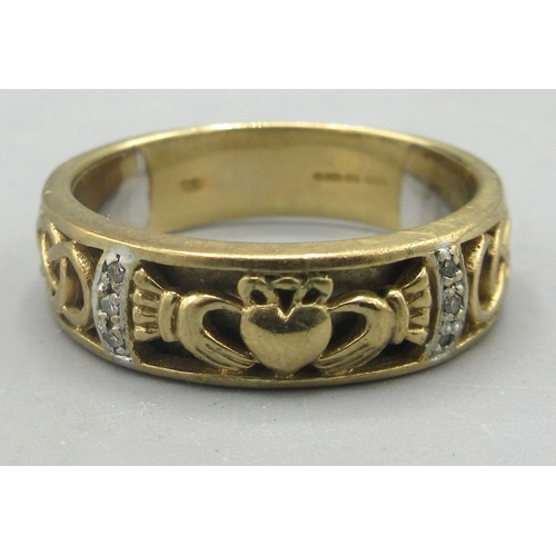 176 - Gents 9ct yellow gold band ring with claddagh decoration set with diamond chips, stamped 375, size X... 