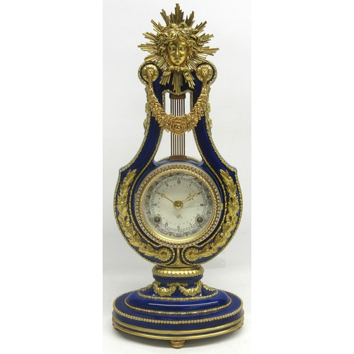 577 - Victoria & Albert Museum, Marie-Antoinette Clock by Franklin Mint, in the form of a lyre, cobalt blu... 