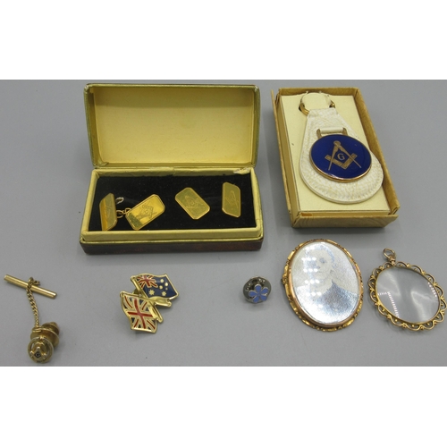 153 - Yellow metal photo frame brooch, a similar fob, a collection of unmarked Masonic jewellery etc.