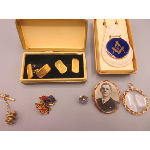 153 - Yellow metal photo frame brooch, a similar fob, a collection of unmarked Masonic jewellery etc.