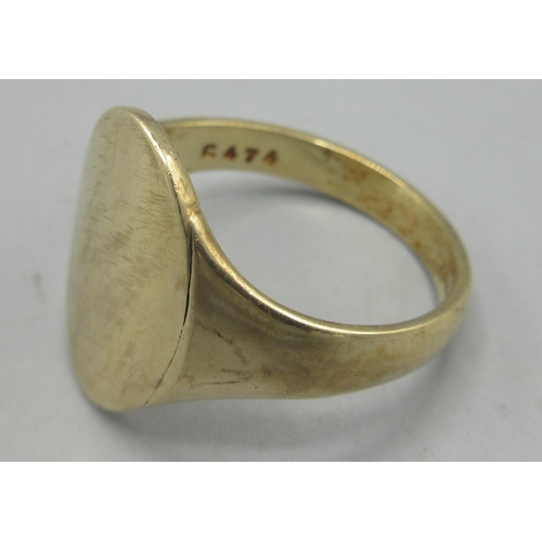 185 - 9ct yellow gold signet ring with plain oval face, stamped 375, size U, 5.91g