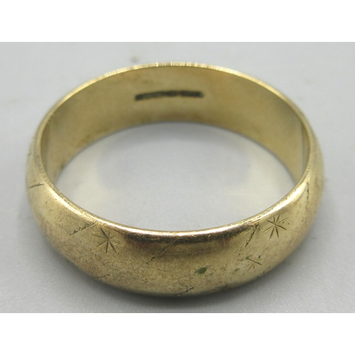 683 - 9ct yellow gold band ring with worn design, stamped 375, 5.18g