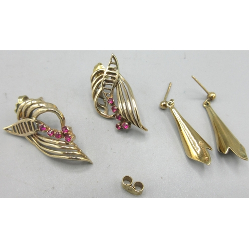 696 - Pair of 9ct yellow gold ornate earrings set with rubies, stamped 375 (one back replaced), and a pair... 