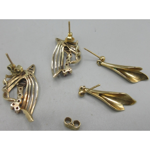 696 - Pair of 9ct yellow gold ornate earrings set with rubies, stamped 375 (one back replaced), and a pair... 