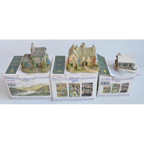 404 - Ten Cumbria/Lake District themed Lilliput Lane cottages and buildings to include Skiddaw, Snowed Inn... 