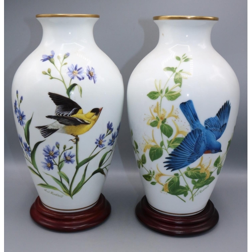 141 - Pair of Franklin Mint porcelain baluster vases 'The Goldfinch in Autumn' and 'The Bluebirds of Summe... 