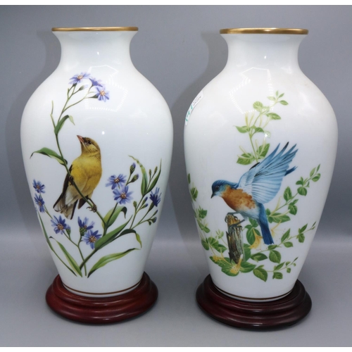 141 - Pair of Franklin Mint porcelain baluster vases 'The Goldfinch in Autumn' and 'The Bluebirds of Summe... 