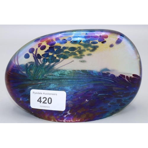 420 - John Ditchfield Glasform iridescent glass paperweight of compressed ovoid form, L15cm