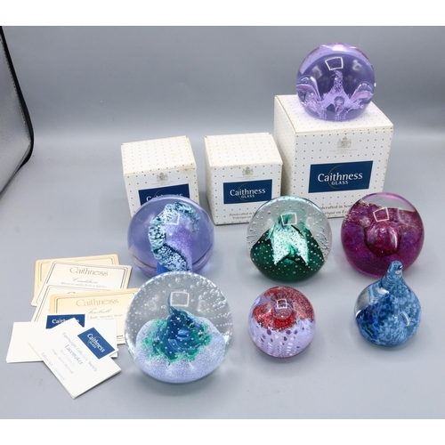 423 - Collection of Caithness glass paperweights, incl. Moonflower, Cauldron, Wavecrest, and others (7)