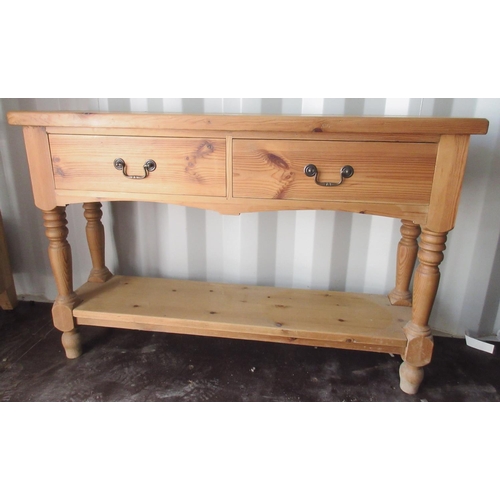 710 - Narrow pine dresser, with two drawers on turned supports with pot-board stretcher, W122cm D31cm H80c... 