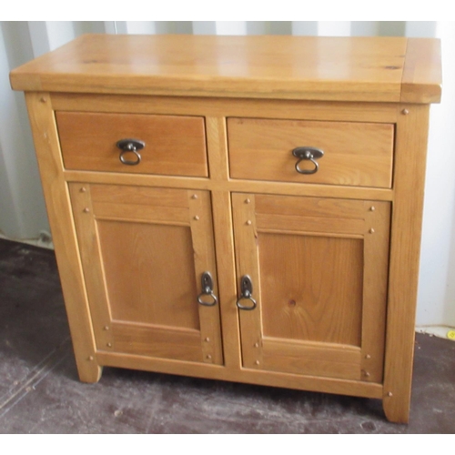 713 - Small contemporary oak side cabinet, two drawers above two doors, W84cm D35cm H87cm