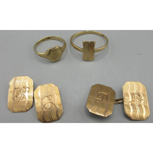 101A - 9ct yellow gold signet ring, size K, another similar ring, size R1/2, a pair of 9ct gold cufflinks w... 