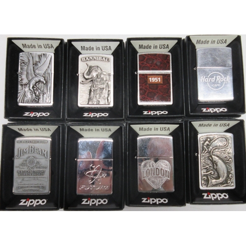 657 - Zippo lighter, 200 Hard Rock Café Amsterdam; 200 Planeta Leather Wrap; 2002724 Phoenix in Flame; 130... 