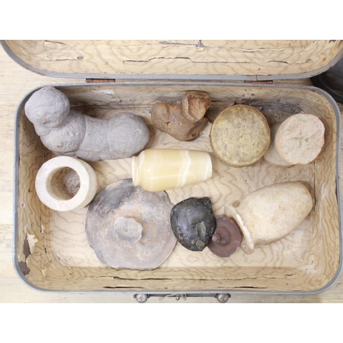 551 - Large selection of stone items and ceramics, including carvings, pots, sling shot balls etc.