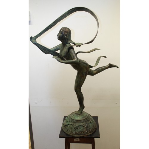 627 - Large bronze statue of woman ribbon dancing in athletic pose, with strong patina to extremities, H85... 