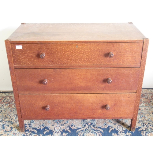 251 - 20th century Heals style oak chest of three long drawers with turned wooden handles, W92cm D48cm H76... 