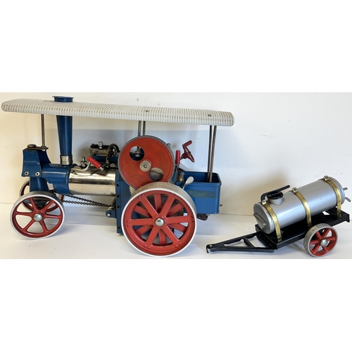 588 - Wilesco live steam traction engine 'Old Smokey' in blue and red livery, L31cm, with Wilesco water tr... 