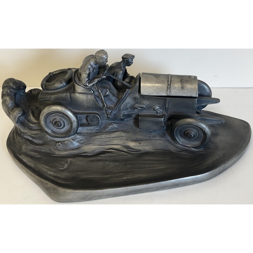 591 - After Wilhelm Zwick, late 20th century pewter-effect inkwell in the form of a racing car with two me... 