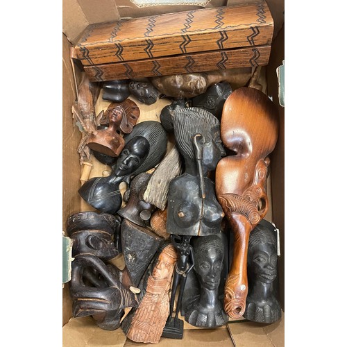 213 - Pair of African carved ebony book ends, H16cm and a collection of other carved ebony and hardwood Af... 