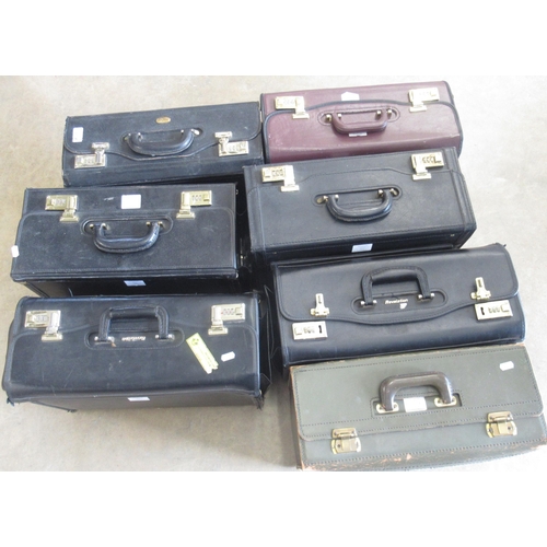 217 - Masters London black leather pilot case, W45cm; two similar Revelation cases and four other cases (7... 